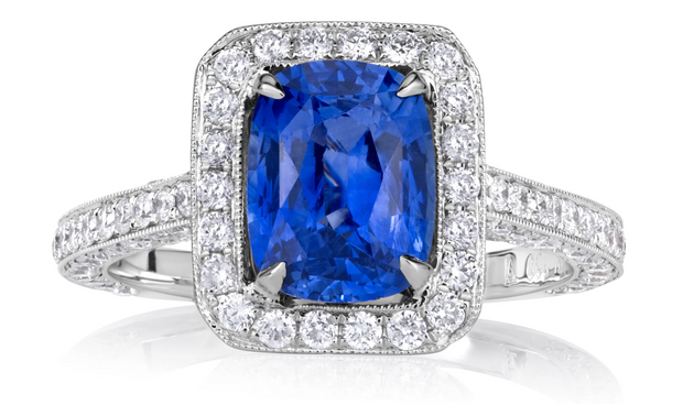 Round Brilliant Cut Diamond and Sapphire Engagement Ring