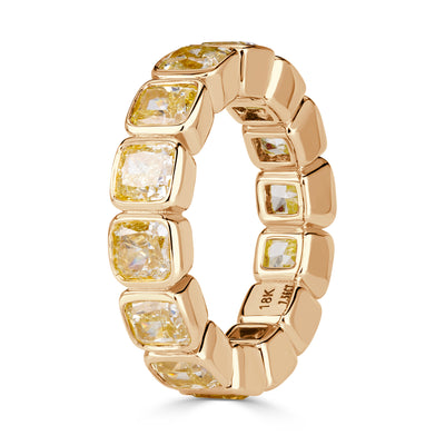 7.56ct Fancy Yellow Cushion Cut Diamond Bezel Set Eternity Band in 18K Yellow Gold